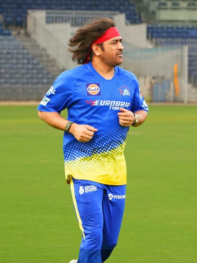 Dhoni seen in old avatar with red hair band and wavy hair before IPL 2024